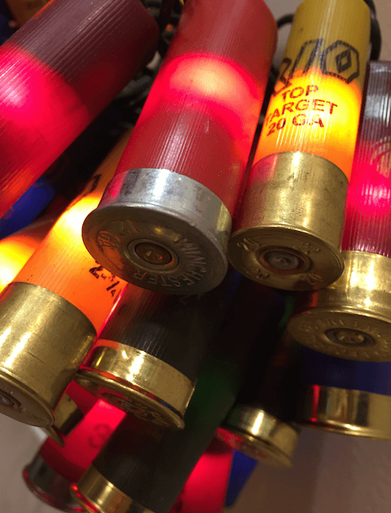 Closeup of multi-colored buckshot lights lit up.