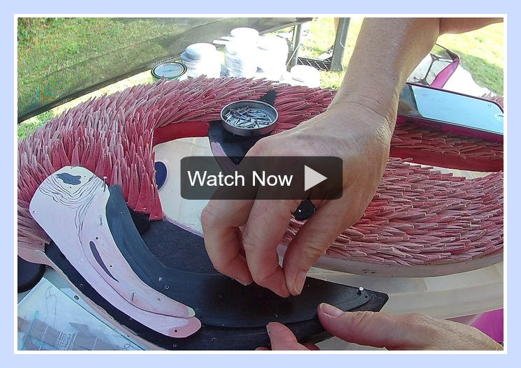 Image of Brad & Sundie Ruppert working on a flamingo piece.